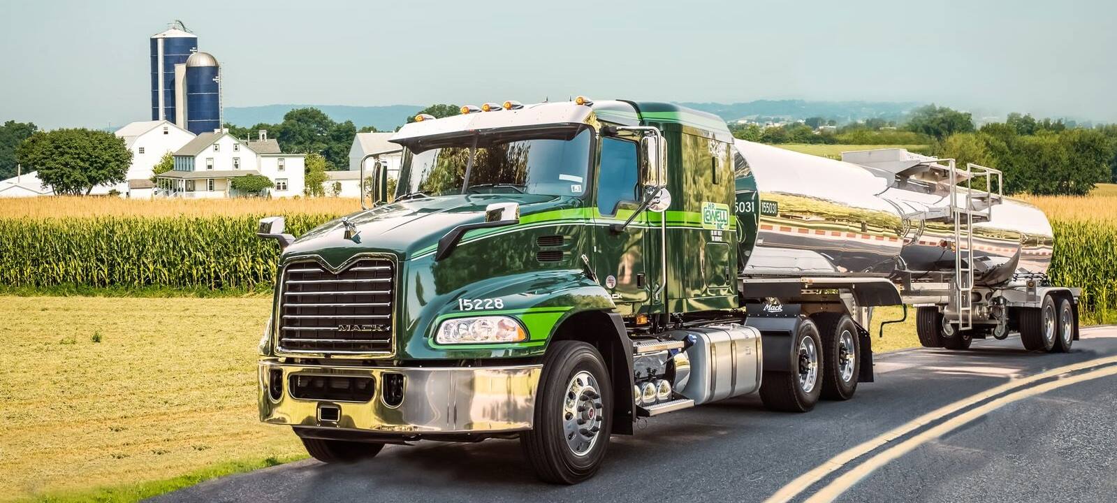 HR Ewell Truck Traveling across the farmland